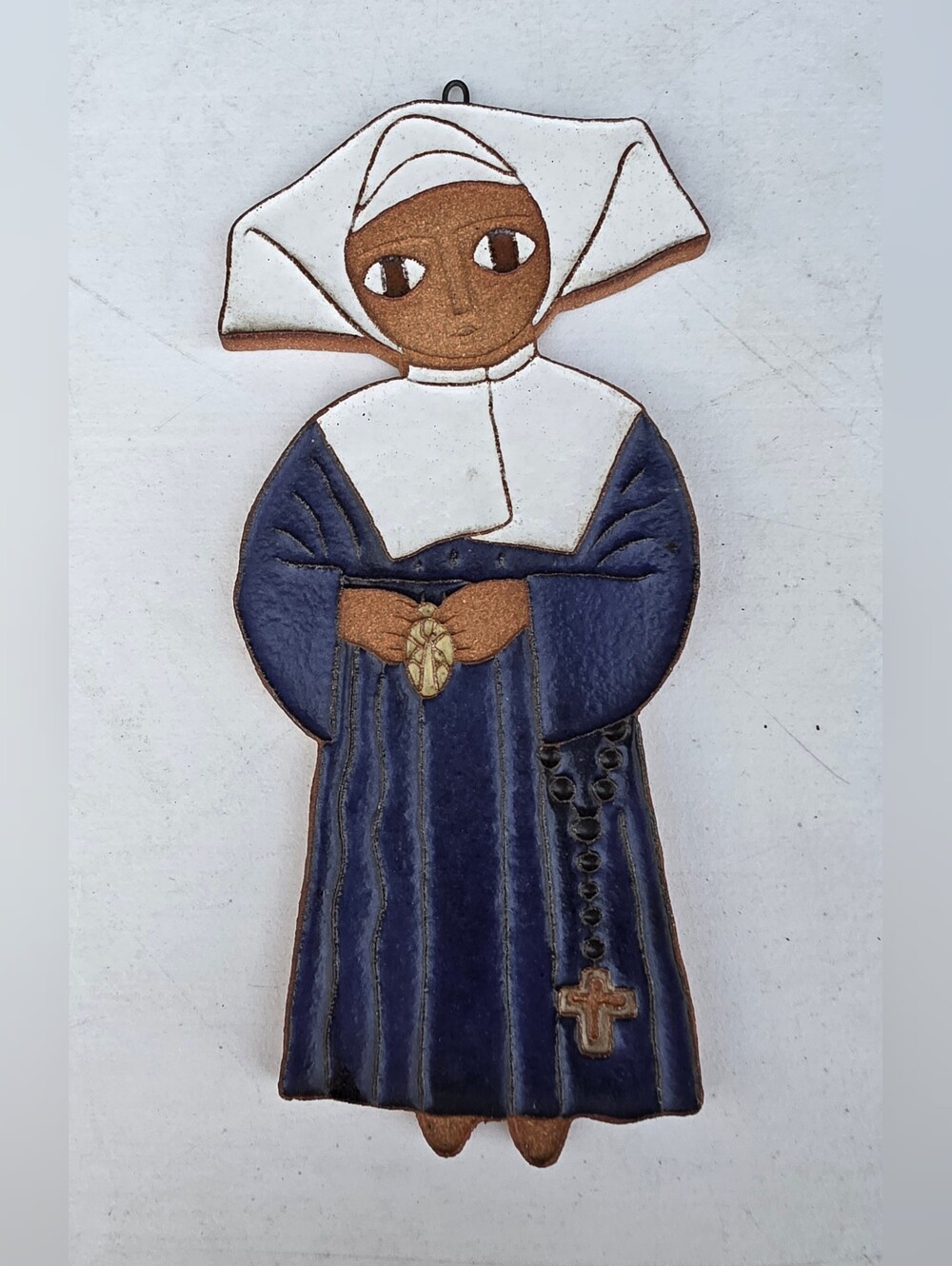 St. Andrew's Abbey Ceramic Nun Wall Plaque - Fr. Maur van Doorslaer Design
